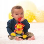 Infantino Zawieszka z naciągiem lew 216184 - obrazek 2